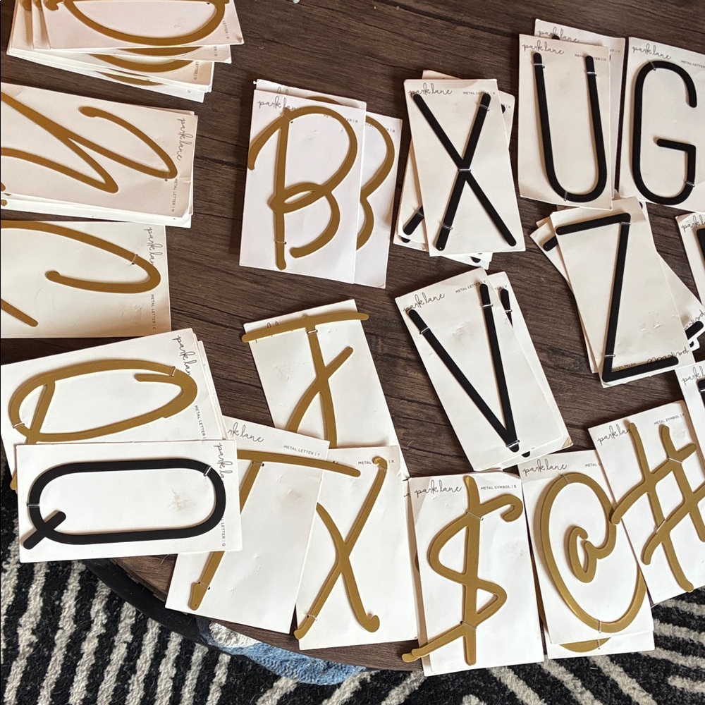 Gold and Black Metal Letters